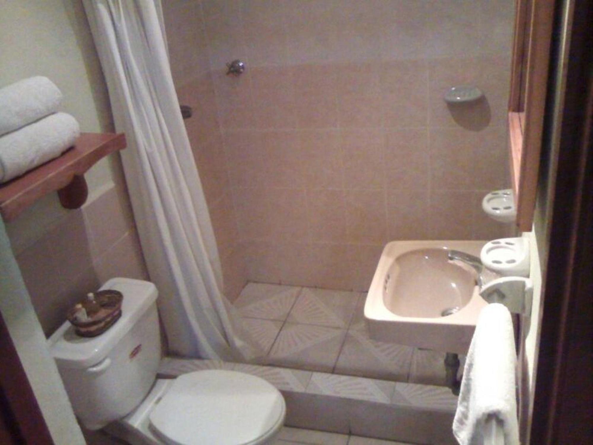 Nakum Hotel Flores Habitación foto