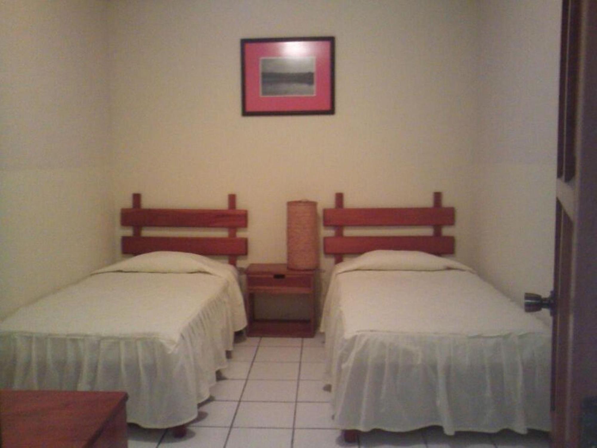 Nakum Hotel Flores Habitación foto
